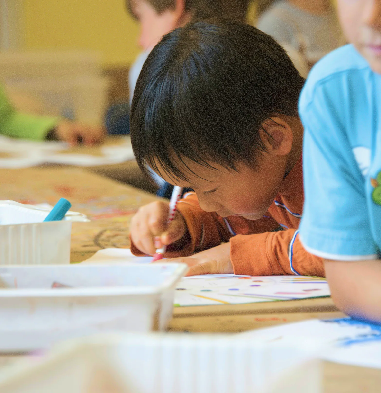Children working on an assignment in a classroom