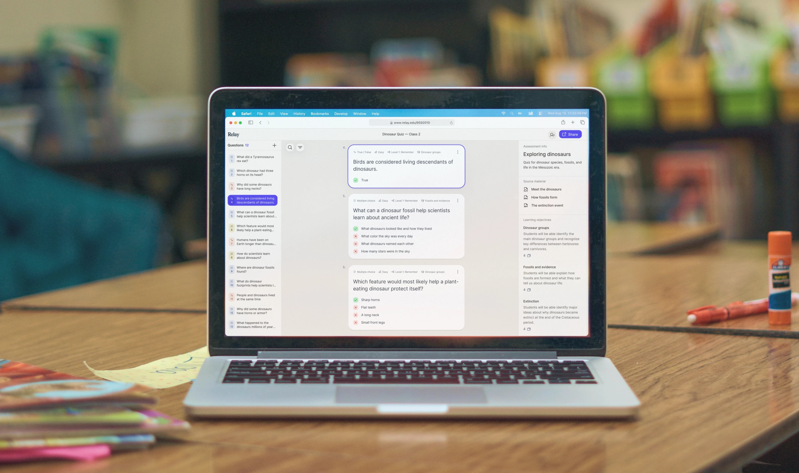 Relay's assessment editor displayed on a laptop in a classroom